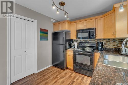 613 303 Slimmon Place, Saskatoon, SK - Indoor Photo Showing Kitchen With Double Sink