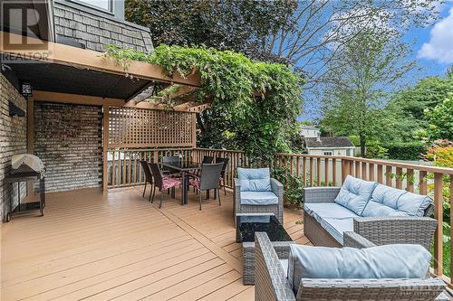Upper deck accessed off kitchen with pergola with gorgeous Wisteria vine. - 2002 Woodway Avenue, Ottawa, ON - Outdoor With Deck Patio Veranda With Exterior