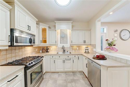 Virtually Staged - 1779 Healy Road, London, ON - Indoor Photo Showing Kitchen With Upgraded Kitchen