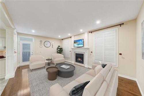 Virtually Staged - 1779 Healy Road, London, ON - Indoor Photo Showing Other Room With Fireplace