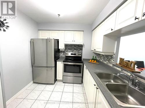 2128 - 68 Corporate Drive, Toronto, ON - Indoor Photo Showing Kitchen With Double Sink