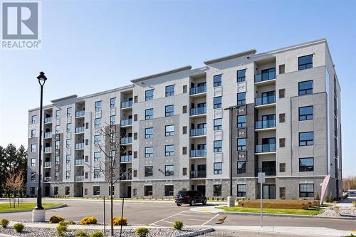 190 Main Street East Unit# 410, Kingsville, ON - Outdoor With Balcony With Facade