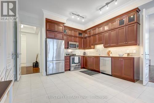 2001 - 10 Bloorview Place, Toronto, ON - Indoor Photo Showing Kitchen With Stainless Steel Kitchen