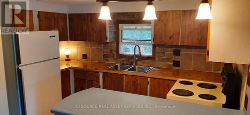132 Kimmetts Side Road, Greater Napanee, ON - Indoor Photo Showing Kitchen With Double Sink