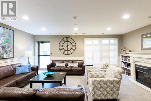 707 - 250 Pall Mall Street, London, ON - Indoor Photo Showing Living Room With Fireplace