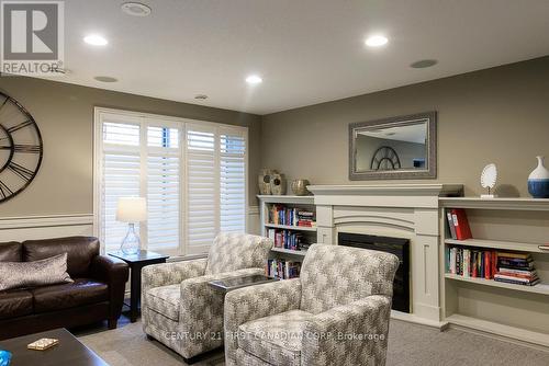 707 - 250 Pall Mall Street, London, ON - Indoor Photo Showing Living Room With Fireplace