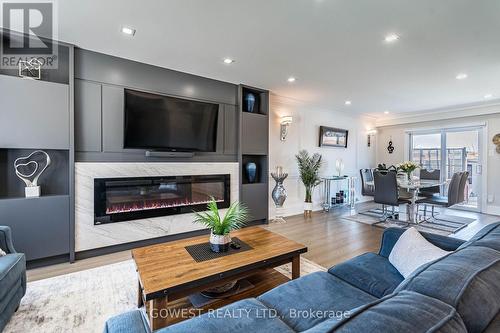 123 Dewitt Road, Hamilton, ON - Indoor Photo Showing Living Room With Fireplace