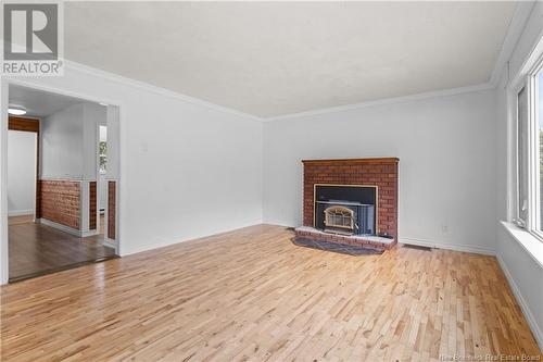 388 Skyline Avenue, Miramichi, NB - Indoor Photo Showing Living Room With Fireplace