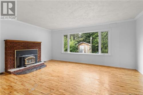 388 Skyline Avenue, Miramichi, NB - Indoor Photo Showing Living Room With Fireplace