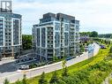 1010 - 58 Lakeside Terrace, Barrie, ON  - Outdoor With Balcony With Facade 