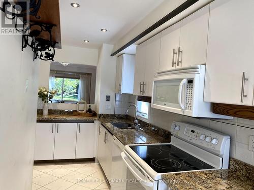 63 - 3050 Orleans Road, Mississauga, ON - Indoor Photo Showing Kitchen With Double Sink