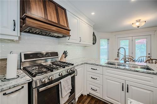 You need a high power fume hood when you are cooking with gas - 61 Richmond Crescent, Stoney Creek, ON - Indoor Photo Showing Kitchen With Stainless Steel Kitchen With Upgraded Kitchen