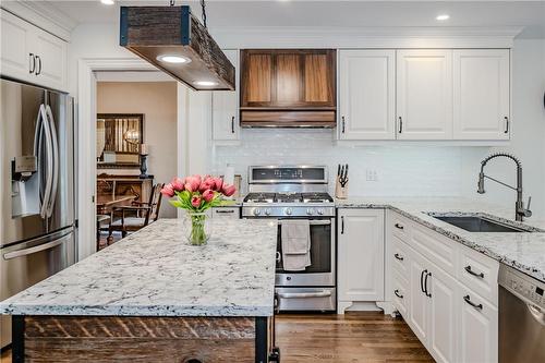 Craftsmanship is evident throughout this custom chef's kitchen - 61 Richmond Crescent, Stoney Creek, ON - Indoor Photo Showing Kitchen With Stainless Steel Kitchen With Upgraded Kitchen