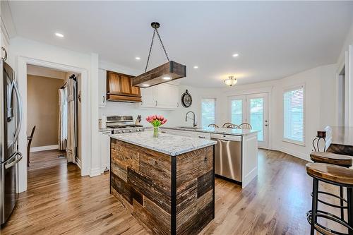 Custom barnboard island with plenty of storage - 61 Richmond Crescent, Stoney Creek, ON - Indoor Photo Showing Kitchen