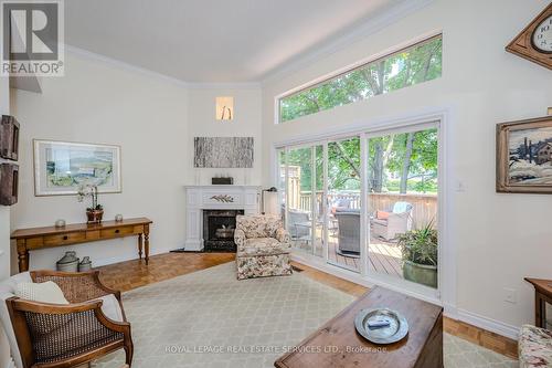2230 - 2230 Marine Drive, Oakville, ON - Indoor Photo Showing Living Room With Fireplace