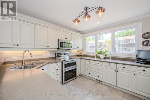 2230 - 2230 Marine Drive, Oakville, ON - Indoor Photo Showing Kitchen With Double Sink