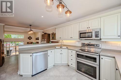 2230 - 2230 Marine Drive, Oakville, ON - Indoor Photo Showing Kitchen With Double Sink