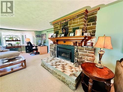 15 Gore Street, Gore Bay, Manitoulin Island, ON - Indoor Photo Showing Living Room With Fireplace