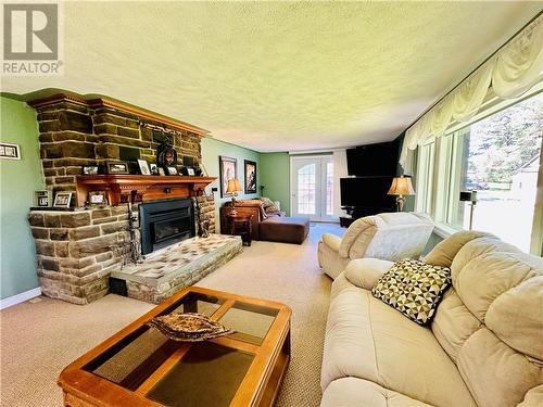 15 Gore Street, Gore Bay, Manitoulin Island, ON - Indoor Photo Showing Living Room With Fireplace