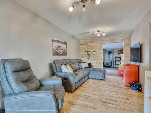 Salon - 740 Ch. St-Jean, Sainte-Marie-Salomé, QC - Indoor Photo Showing Living Room With Fireplace