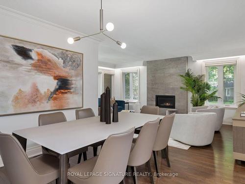 2 Farningham Cres, Toronto, ON - Indoor Photo Showing Dining Room With Fireplace