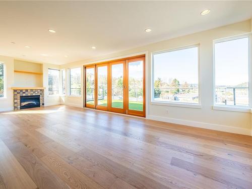 401-580 Stewart Ave, Nanaimo, BC - Indoor Photo Showing Other Room With Fireplace