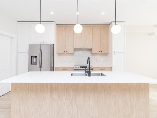 960/962 Loch Glen Pl, Langford, BC - Indoor Photo Showing Kitchen With Double Sink With Upgraded Kitchen