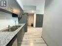 G212 - 275 Larch Street, Waterloo, ON  - Indoor Photo Showing Kitchen With Double Sink 