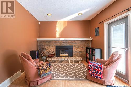 2243 Mahony Crescent, Regina, SK - Indoor Photo Showing Living Room With Fireplace