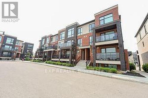 40 - 100 Dufay Road, Brampton, ON - Outdoor With Balcony With Facade