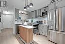 304 - 200 Burnhamthorpe Road E, Mississauga, ON  - Indoor Photo Showing Kitchen With Upgraded Kitchen 