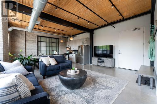 217 - 68 Broadview Avenue, Toronto, ON - Indoor Photo Showing Living Room