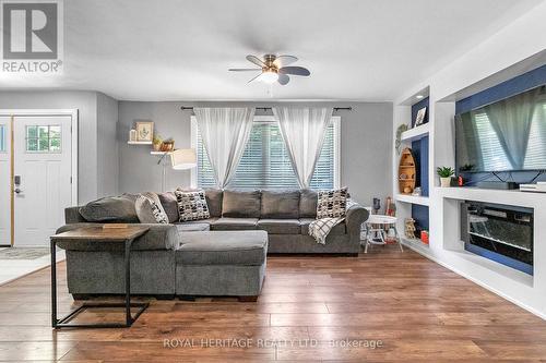 28 Cliffside Drive, Kawartha Lakes, ON - Indoor Photo Showing Living Room With Fireplace