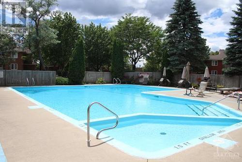 520 Canteval Terrace Unit#207, Ottawa, ON - Outdoor With In Ground Pool With Backyard