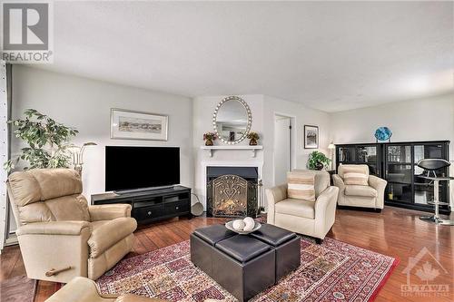 520 Canteval Terrace Unit#207, Ottawa, ON - Indoor Photo Showing Living Room With Fireplace