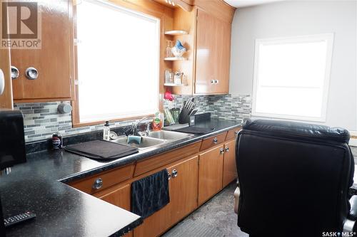 215 4Th Avenue E, Assiniboia, SK - Indoor Photo Showing Kitchen With Double Sink