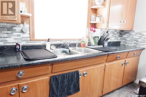 215 4Th Avenue E, Assiniboia, SK - Indoor Photo Showing Kitchen With Double Sink