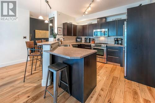 1128 Sunset Drive Unit# 1402, Kelowna, BC - Indoor Photo Showing Kitchen With Stainless Steel Kitchen With Double Sink