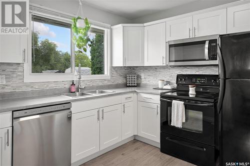 46 Rupert Drive, Saskatoon, SK - Indoor Photo Showing Kitchen With Double Sink