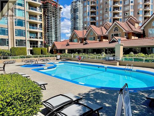 1152 Sunset Drive Unit# 1003, Kelowna, BC - Outdoor With In Ground Pool With Facade