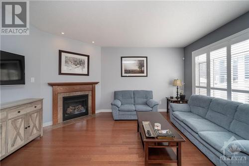 23 Hibiscus Way, Ottawa, ON - Indoor Photo Showing Living Room With Fireplace