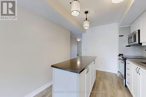 6 - 153 William Duncan Road, Toronto, ON - Indoor Photo Showing Kitchen