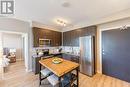 506 - 22 East Haven Drive, Toronto E06, ON  - Indoor Photo Showing Kitchen 