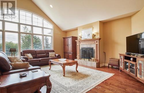 106 Cawkers Cove Road, Scugog (Port Perry), ON - Indoor Photo Showing Living Room With Fireplace