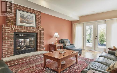 106 Cawkers Cove Road, Scugog (Port Perry), ON - Indoor Photo Showing Living Room With Fireplace