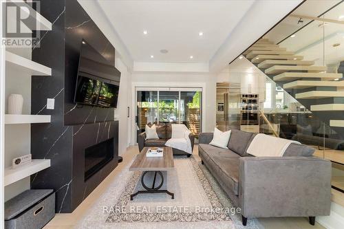 1566 Mount Pleasant Road, Toronto, ON - Indoor Photo Showing Living Room With Fireplace