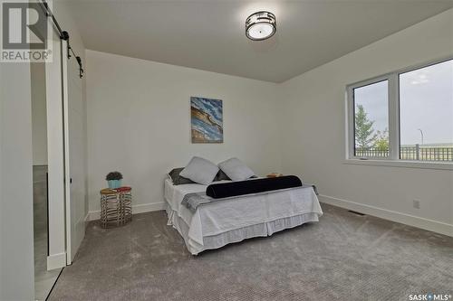 323 Woolf Bay, Saskatoon, SK - Indoor Photo Showing Bedroom