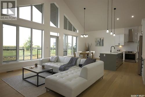 323 Woolf Bay, Saskatoon, SK - Indoor Photo Showing Living Room