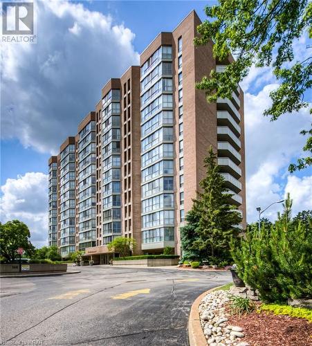 entrance to parking lot - 265 Westcourt Place Unit# 206, Waterloo, ON - Outdoor With Facade