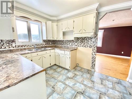 21 Baxter Drive, Eastport, NL - Indoor Photo Showing Kitchen With Double Sink